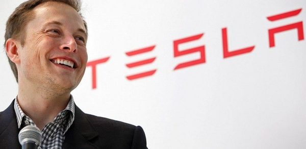 Elon Musk and a Tesla vehicle