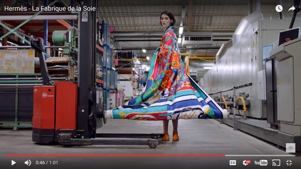 Still from the Hermès branded film shot inside its Lyon silk factory