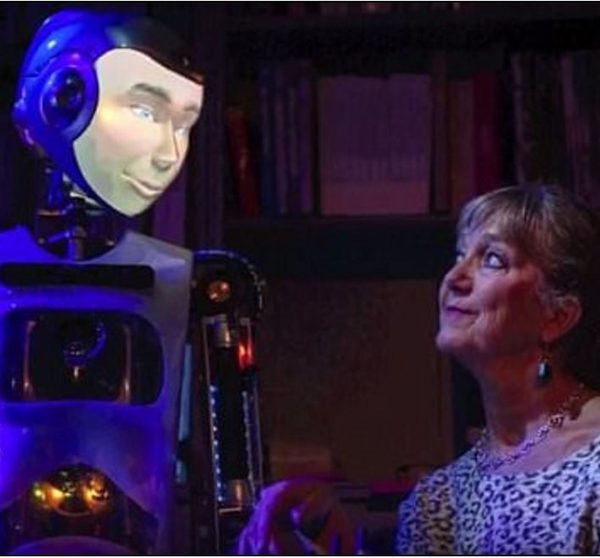 A robothespian performing on stage with human actors
