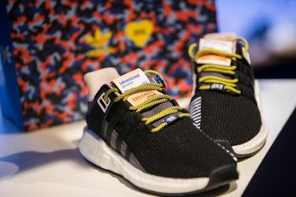 Adidas sneakers in the Berlin subway seat pattern