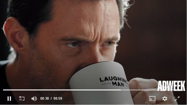 Hugh Jackman in an ad for his Laughing Man coffee brand