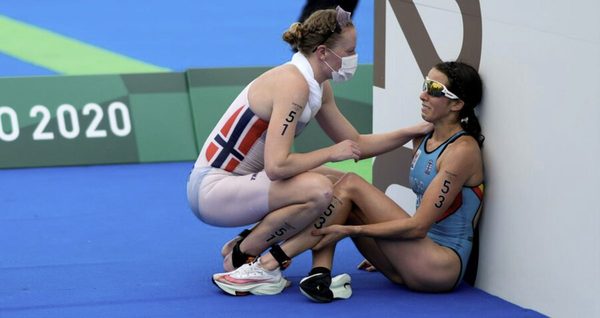 Olympic athletes sharing a moment of sportsmanship
