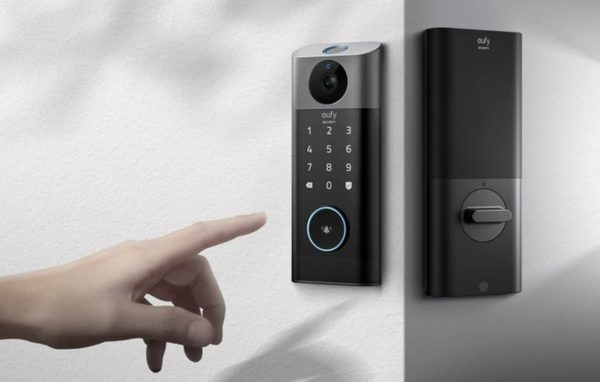 A video doorbell mounted next to a front door
