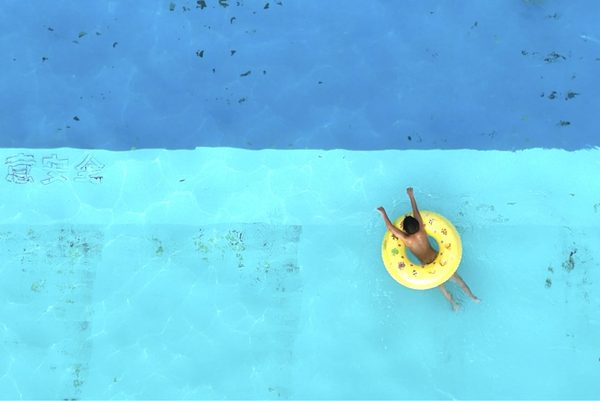 An aerial photograph of a backyard swimming pool
