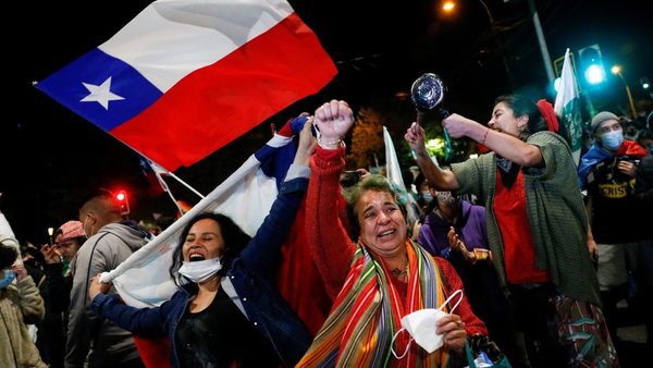 Voters and campaign materials from the Chilean constitutional referendum