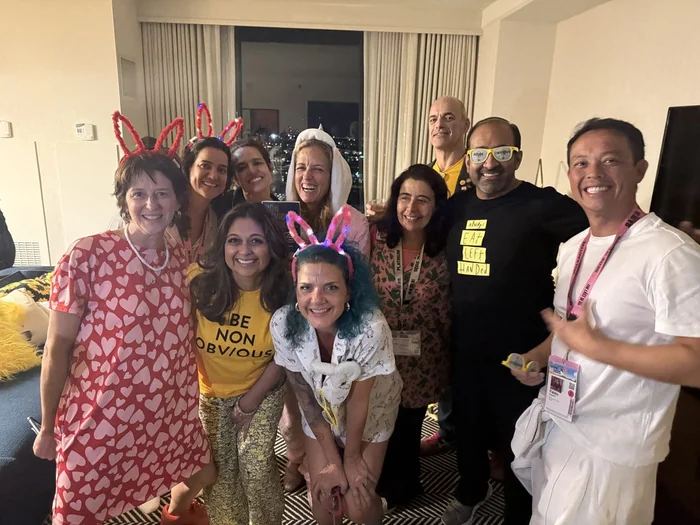 Guests in pajamas at the Non-Obvious Pajama Party