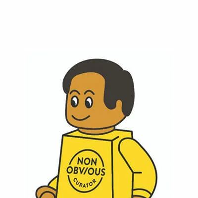 A drawing of Rohit as a lego man in a Non-Obvious Curator shirt